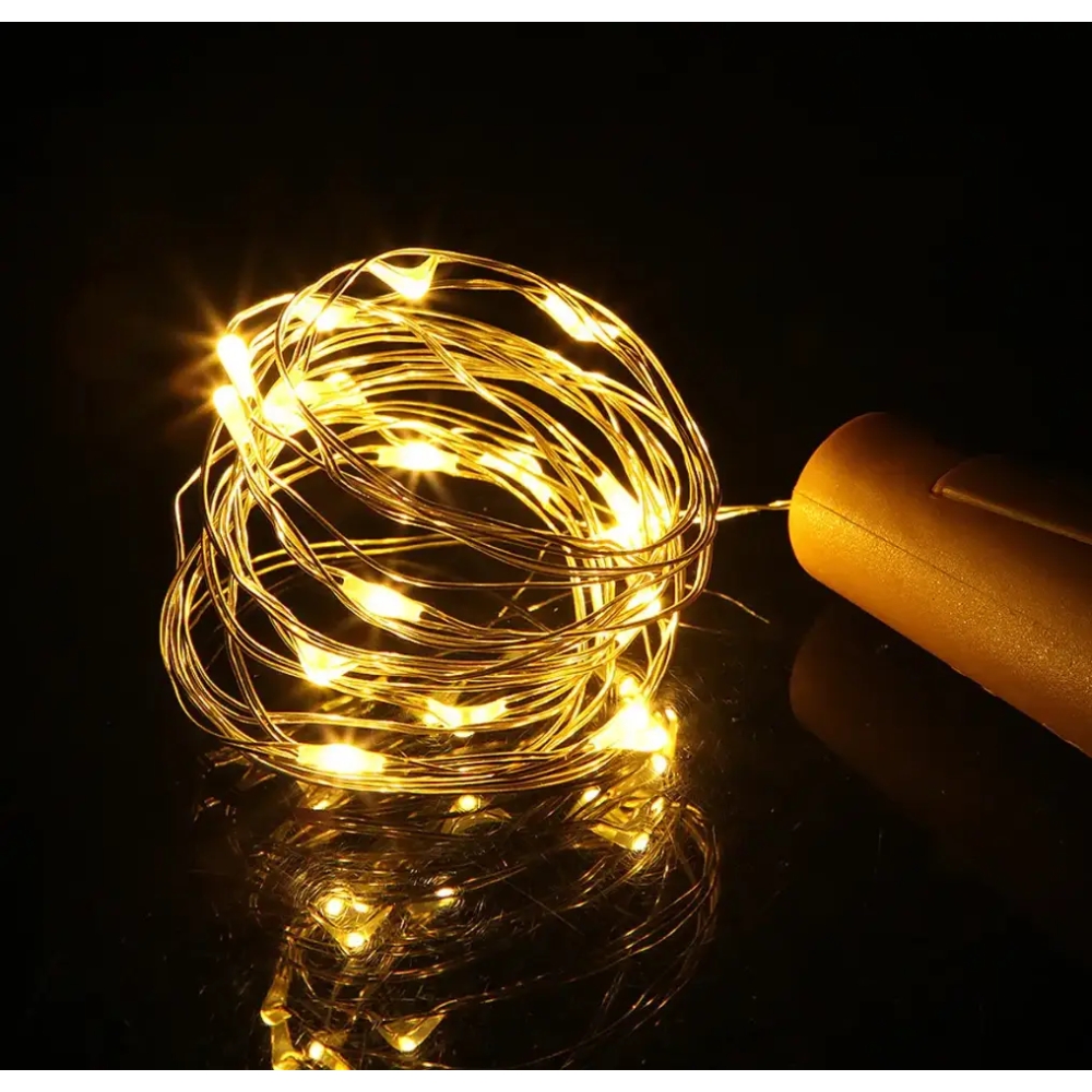 Гірлянда нитка Корка світлодіодна крапля роси 20 LED 2 м на батарейках Теплий білий